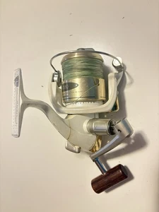 CARRETE DE PESCA GIRATORIO SHIMANO STRADIC 6000FG Blanco/Dorado/Madera - Imagen 1 de 12
