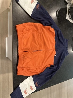 Jaqueta Adidas azul laranja e branca masculina corta-vento pequena - Imagem 1 de 4