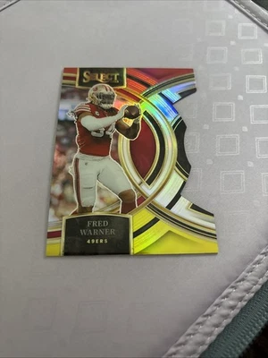 2023 Panini Select Premier Level Fred Warner #195 Red & Yellow Prizm Die-Cut - Image 1 of 2