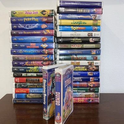 Lot Disney VHS Tapes Clamshell Cases 10 Black Diamond New Dumbo Sleeping Beauty - Image 1 of 4