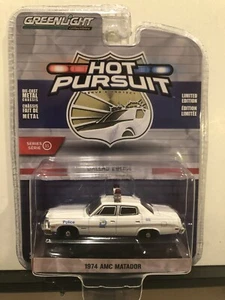 1/64 GREENLIGHT HOT PURSUIT 1974 AMC MATADOR DALLAS POLIZEIAUTO WEISS - Bild 1 von 2