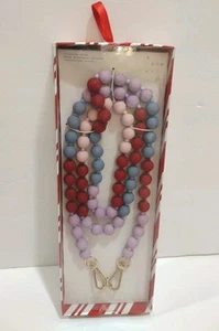 Bandoulière lanière bracelet téléphone universel A New Day blanc violet or perles - Photo 1 sur 4