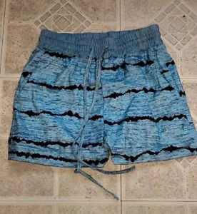 Pantalones cortos pequeños con cordón y bolsillos para mujer - Imagen 1 de 5