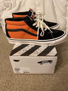 vans laranja e preto