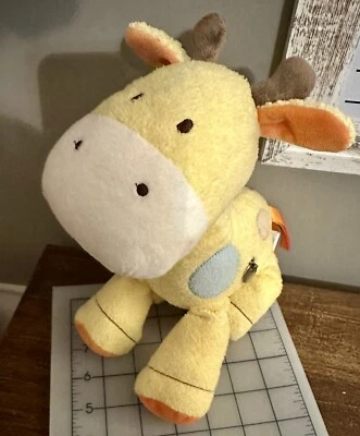 Peluche musical de jirafa amarilla pálida bebé Just One You de Carter's Foto 1 de 4