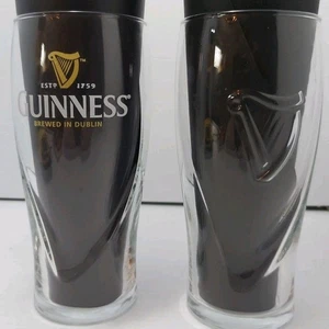 Guinness Pint Beer Glasses Set Of 2 Brewed in Dublin Galaxy Style 3D Harp 6.75” - Picture 1 of 10