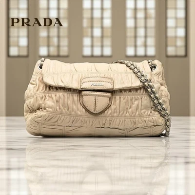 Bolso de hombro Prada Nappa Gaufre piel de becerro acanalada - cadena - solapa - beige crema lujo Foto 1 de 4