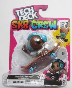 Tech Deck SK8 Crew Series 1 Figur mit blauen Kopfhörern Skateboard NEU versiegelt 2024 - Bild 1 von 2
