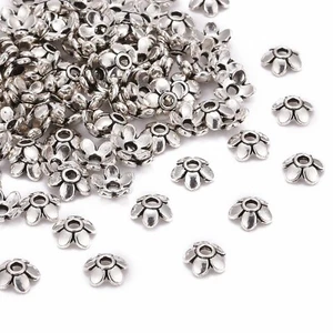 200 piezas Tapas de cuentas de flores antiguas chapadas en plata tibetana de 5 pétalos 6,5 x2 mm - Imagen 1 de 6