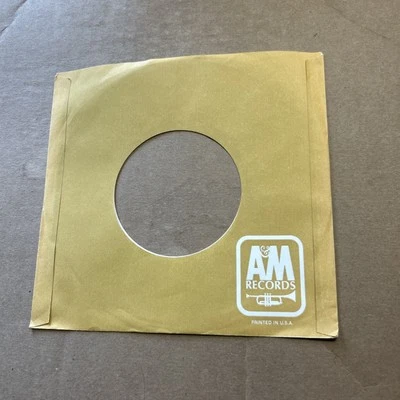 1 Company Sleeve Only Tan A&M Records Bugle Logo Foto 1 de 3