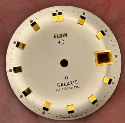 Reloj ELGIN GALAXIE vintage de los años 70 como nuevo ~ 29,65 mm esfera con índices dorados y ventana de fecha Foto 1 de 4