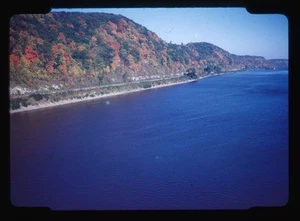 Red Boarder Autumn Colors Reflected in Calm River Water - Picture 1 of 2