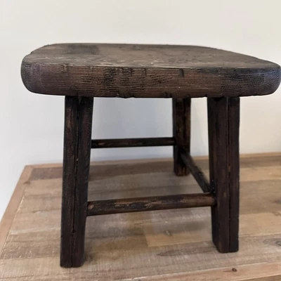 Taburete pequeño primitivo vintage madera oscura rústico terroso decoración soporte para plantas Foto 1 de 4