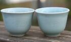 Pair Of Chinese Celadon Cups W/ Koi