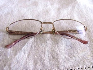 VINTAGE 'TURA' WOMAN'S EYEGLASS FRAME HALF RIM GOLD WITH ORNATE DESIGN ARMS - Picture 1 of 8