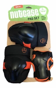 Nutcase Youth Elbow Knee Wrist Pads Ages 8+ Black Orange NEW - Picture 1 of 2