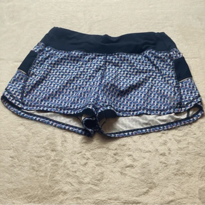 Conjunto de Pantalones Cortos para Correr Athleta Ready Tono Azul con Diseño Geo Multicolor Talla Pequeña Foto 1 de 4