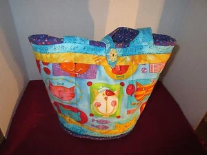Handgefertigte bunte Baumwollhandtasche mit lächelnden Katzengesichtern  - Bild 1 von 5