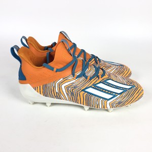orange adidas cleats