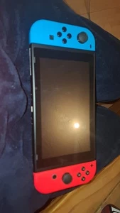 Nintendo Switch With A Case - Picture 1 of 3