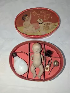 Juego de enfermería My Dolly's de 1930 con muñeca Kewpie de 4,5" L y botella de leche de vidrio Japón - Imagen 1 de 7