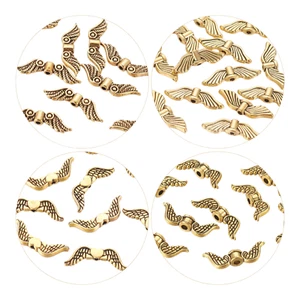 50x Flügelperlen 18-23x7mm Flügel Perlen Engelsflügel Engel Gold Metallperlen - Bild 1 von 6