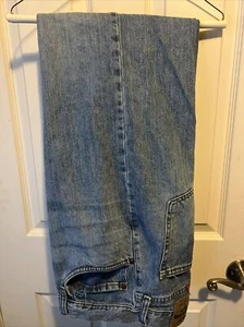 Pantalones de mezclilla para hombre Wrangler lavados en piedra 44x30 excelente estado - Imagen 1 de 2