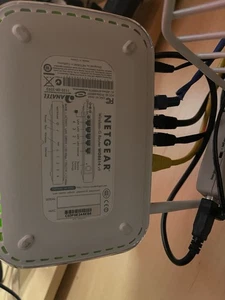 Netgear WGR614 54 Mbps 4-Port 10/100 Wireless G Router (WGR614v9) - Picture 1 of 4