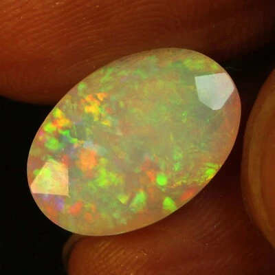 4.70Cts Natural Color Play Unheated White Opal Oval Cut Gemstone from Ethiopia - Image 1 of 4