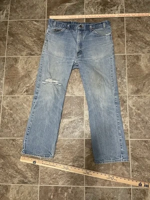 Винтажные джинсы 80-х Levi's 517 с оранжевой застежкой размер 36x28,5 классические искусственно состаренные - Изображение 1 из 3