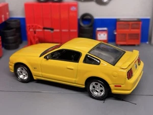 2005-2009 Ford Mustang GT Yellow 1/64 Scale Diorama Model - Picture 1 of 5