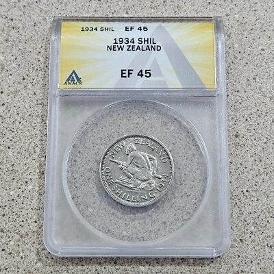 Moneda de 1 chelín de Nueva Zelanda 1934 ANACS EF 45- 50% moneda de plata - guerrero maorí Foto 1 de 4