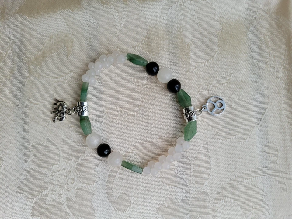 Pulsera de cuentas de piedras preciosas de astrología de luna nueva con dijes Tauro piedra lunar obsidiana Api Foto 1 de 4
