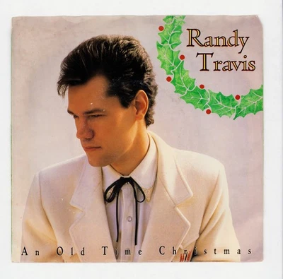 Randy Travis - Country WB 45 RPM - An Old Time Christmas / Wrap My Heart Up VG+ - Image 1 of 4