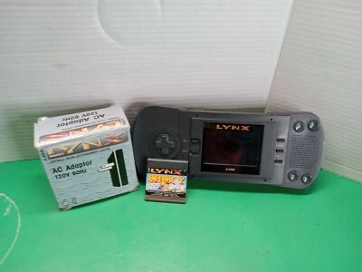 Consola Atari Lynx ¡PARA REPUESTOS O REPARACIÓN! Sin alimentación - Sin cubierta de batería Leer descripción Foto 1 de 4
