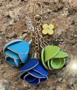 TURQUOISE BLUE YELLOW FAUX LEATHER ROSE TASSEL CRYSTAL GREEN CLOVER BAG CHARM 5" - Picture 1 of 4