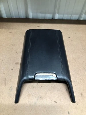 Lincoln Navigator 2003-2006 5,4 L consola delantera tapa reposabrazos de cuero negro dañado Foto 1 de 4