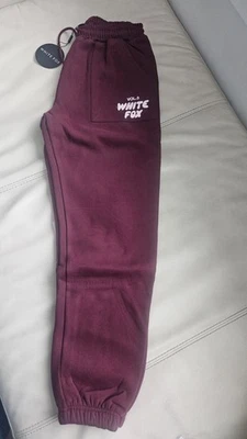Nuevo en bolsa zorro blanco pequeño fuera del escenario pantalones deportivos en terciopelo rojo nuevos con etiquetas Foto 1 de 4