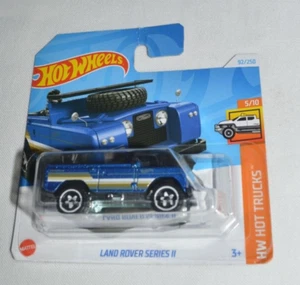HOT WHEELS 2024 HW HOT TRUCKS 5/10 - LAND ROVER SERIES II BLUE ON A SHORT CARD - Picture 1 of 6