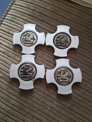 VAUXHALL MERIVA A 2003-2005  ALLOY WHEEL CENTRE CAPs x 4 (FLAT TYPE) - Image 1 of 4