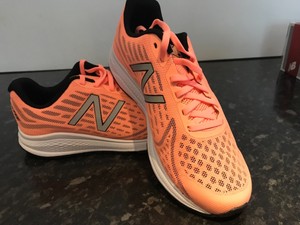 new balance orange trainers