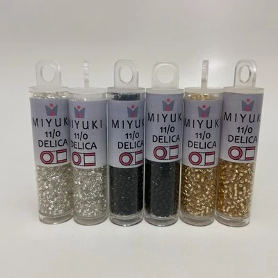 Juego de 6 tubos: cuentas Miyuki Delica 11/0, cristal S/L, oro S/L, negro azabache, 43 gramos Foto 1 de 4