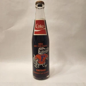 VINTAGE 1984 FLORIDA GATORS SEC CHAMPS COCA-COLA 10oz. BOTTLE SEALED FULL RARE - Picture 1 of 7