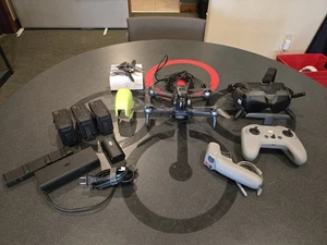 DJI FPV Combo + Fly more Kit w RC + Motion Controller + Googles - Picture 1 of 12