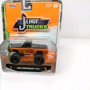 JADA JUST TRUCKS 1985 CHEVROLET C10 1:64 Orange Black Halloween Push Bar 4x4 - Picture 1 of 7