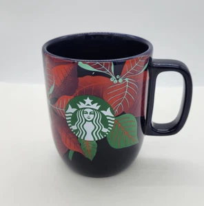 Tazza caffè Starbucks Christmas Poinsettia indaco blu ceramica 12 oz nuova - Foto 1 di 6