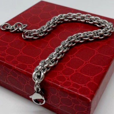 BRACCIALE A CORDA INTRECCIATO DA UOMO COLOR ARGENTO ACCIAIO INOSSIDABILE FIRMATO - Immagine 1 di 4