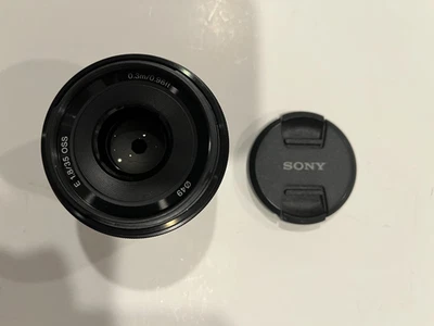 Sony 35mm f/1.8 SEL35F18 OSS AF Wide Angle Prime Lens E Mount w/ Lens Caps - Image 1 of 3