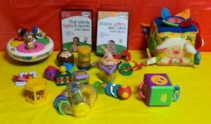 baby toys including vintage top- Little Steps DVD, Cloth Farm Cube & rattles
