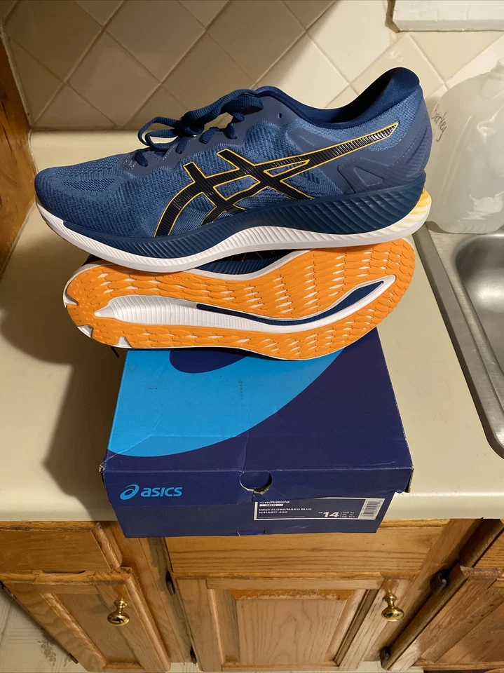 Zapato para correr ASICS GlideRide para hombre, hilo dental gris/azul Mako, 11,5 D(M) EE. UU. Foto 1 de 1